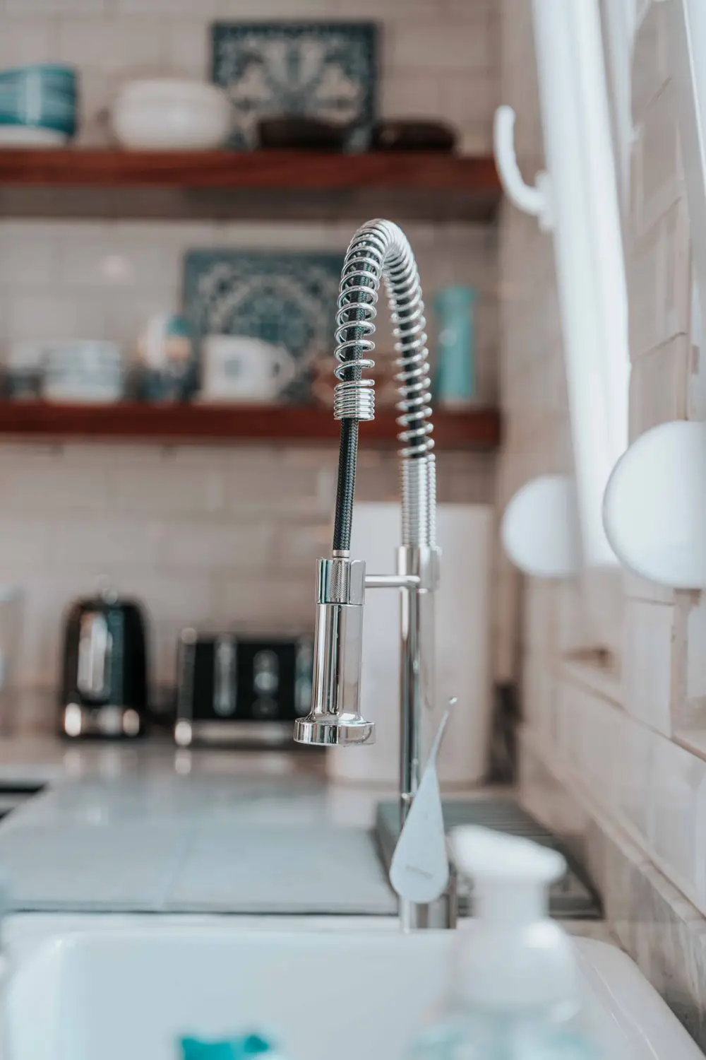 Contemporary kitchen tap and sink installation completed by J Copland Plumbing and Heating